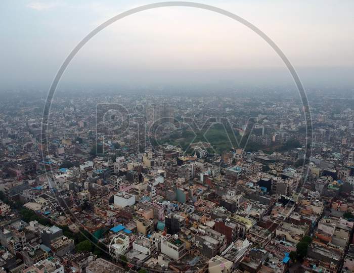 Early morning extreme wide drone view of a district in Delhi