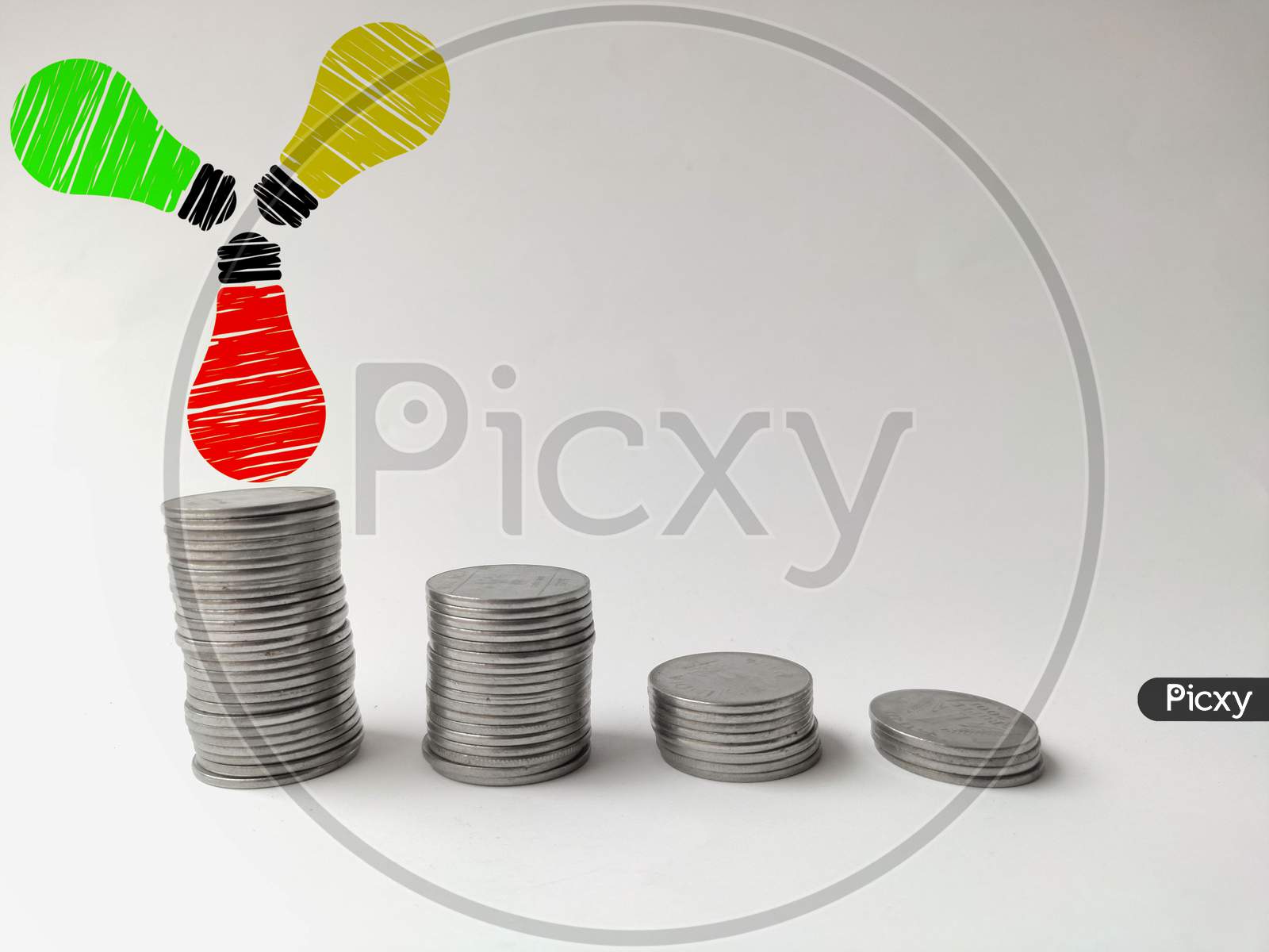 Increasing coin stack with bulbs idea and imagination concept