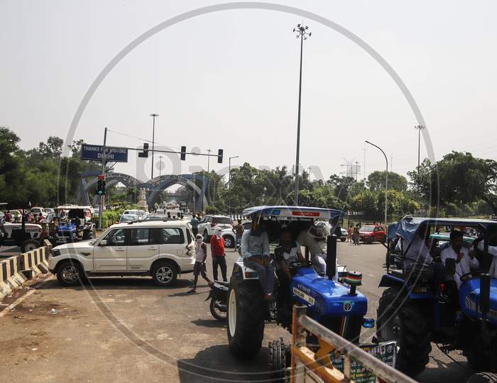 Farmers block the Delhi-Noida border road during a protest against farm bills passed by India's parliament, in New Delhi, India, September 25, 2020.