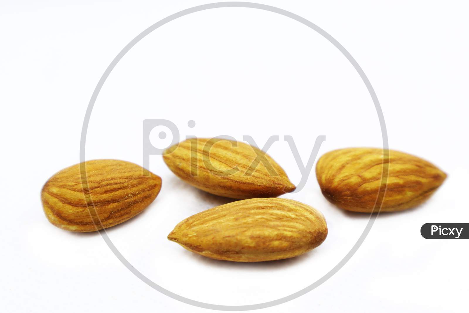 Almonds On White Background. Almond Set, Side View. Full Depth Of Field.