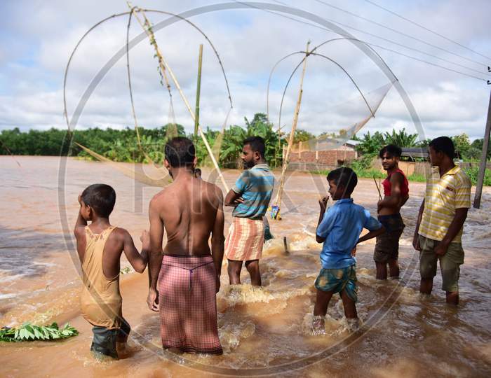 Villagers fishing on  flood water at Juripar village near Kampur  in Nagaon District of Assam on sep 25,2020.