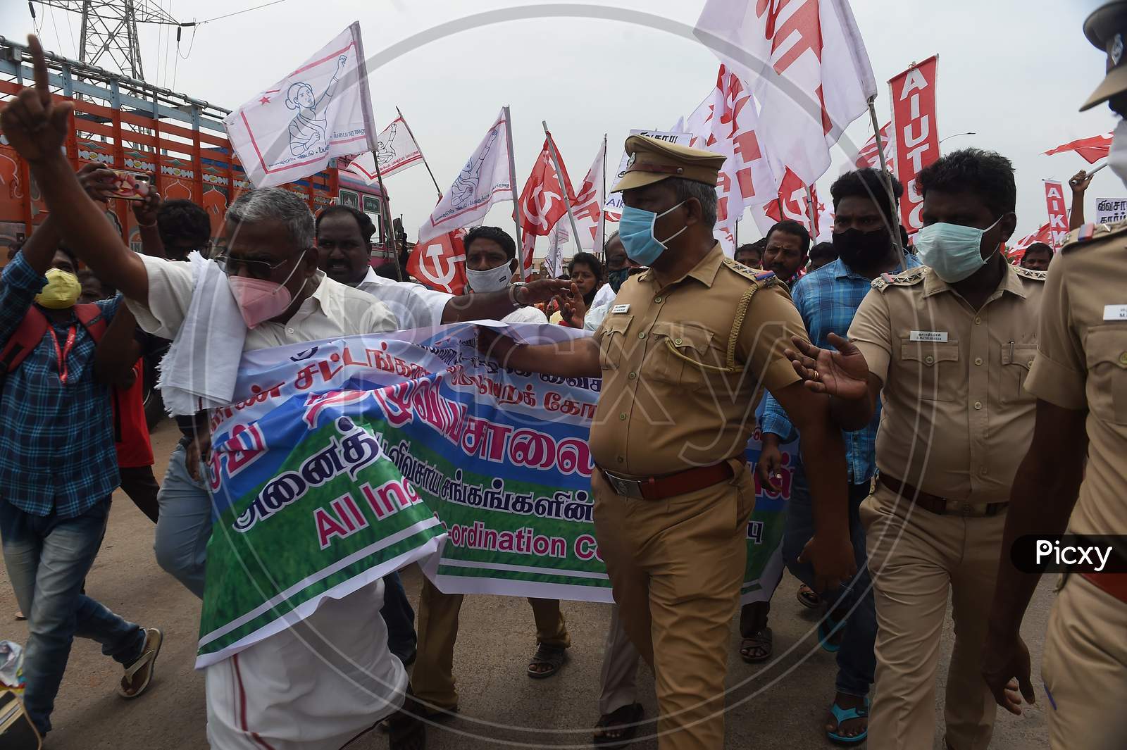 Activists Of Communist Party Block Road During A Protest Against The Farm Bills Passed In Both The Houses Of Parliament Recently, in Chennai Friday, Sept. 25, 2020