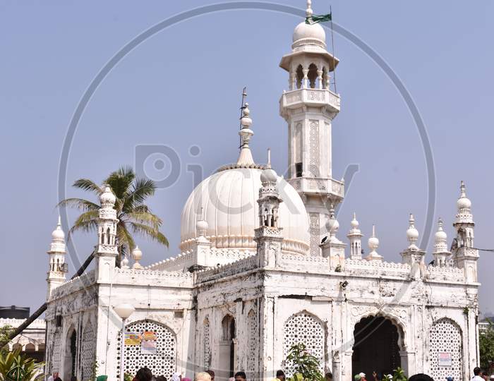 A White Masjid Situated In Between Ocean