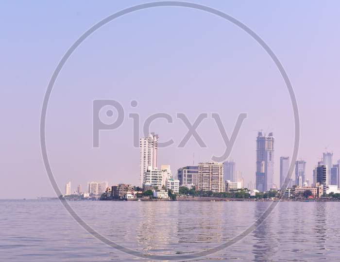 Mumbai Sea Shore With Tall Buildings Near Ocean