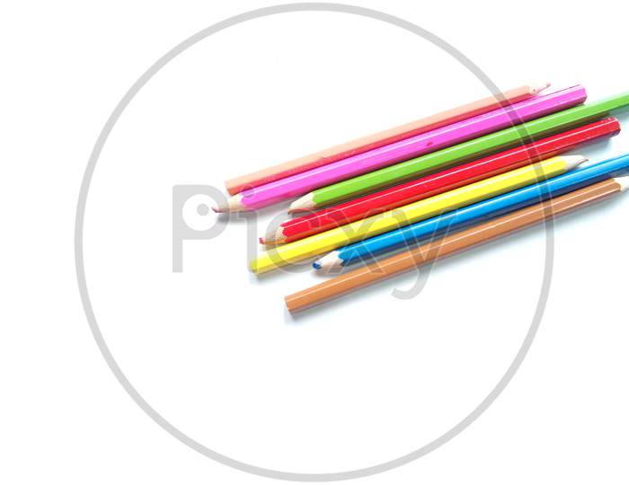 Back to school. Color pencils isolated in white background