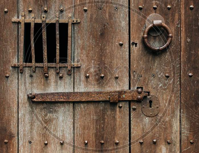 A rusty metal door