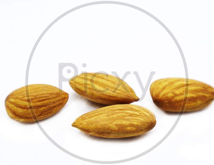 Almonds On White Background. Almond Set, Side View. Full Depth Of Field.