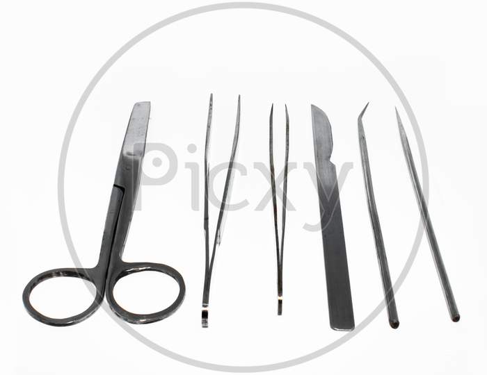 Bunch of surgical instruments on white background