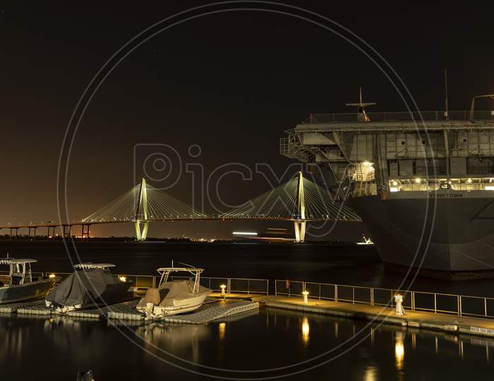 USS Yorktown At Night With Cooper River Bridge In Background
