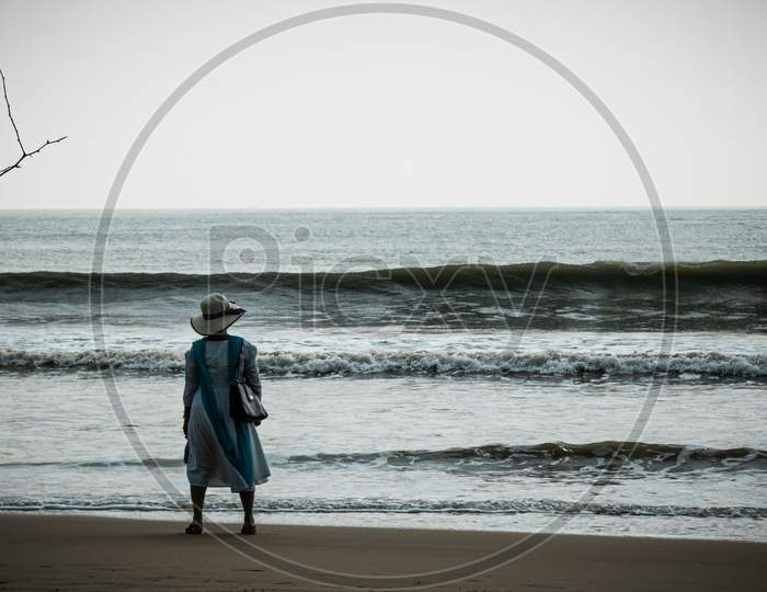 Women standing in front of sea
