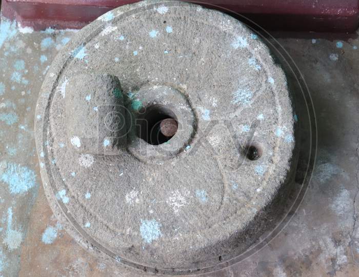Traditional Indian vintage rural used stone grinder, hand grinder, turn around called tiragali