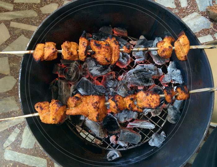 Chicken Kebab In Home Made Tandoori Stove.