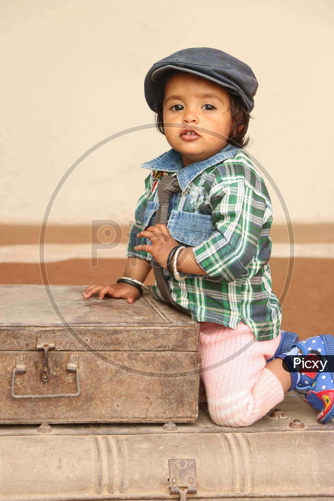 2 Year Old Beautiful Girl Wearing Cap Tie And Boy Dress, 2 Year Old Beautiful Girl Sitting On Iron Box,