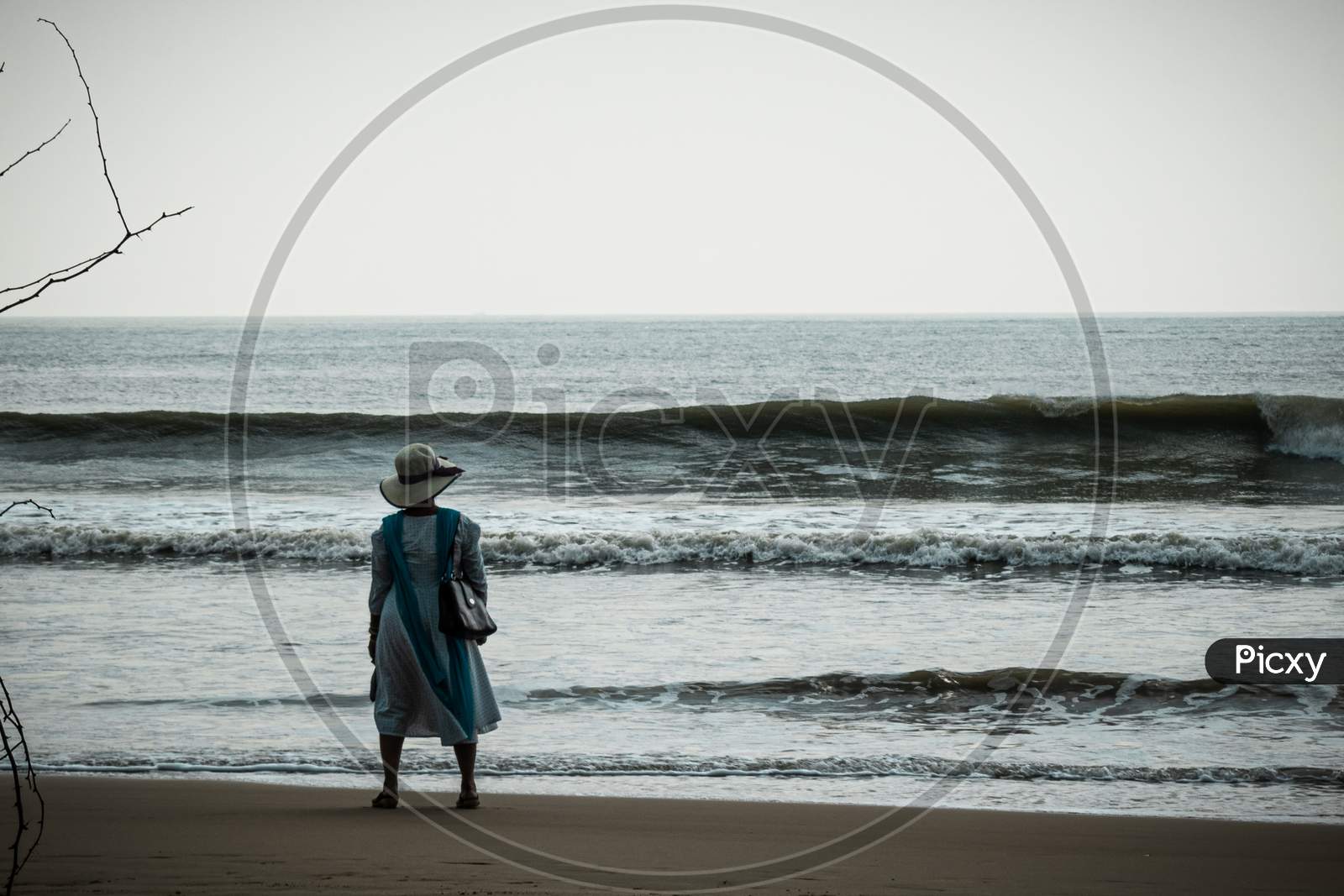 Women standing in front of sea