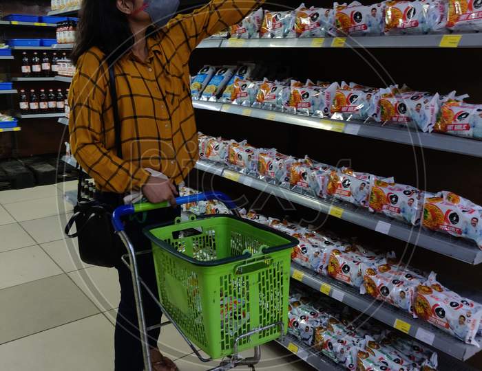 Women shopping groceries at market