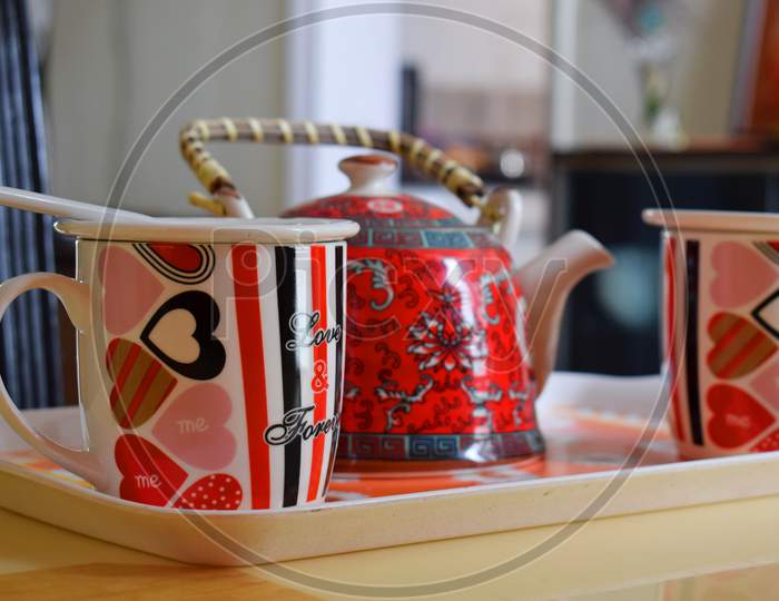 Tea Cup With Kettle And Beautiful Art