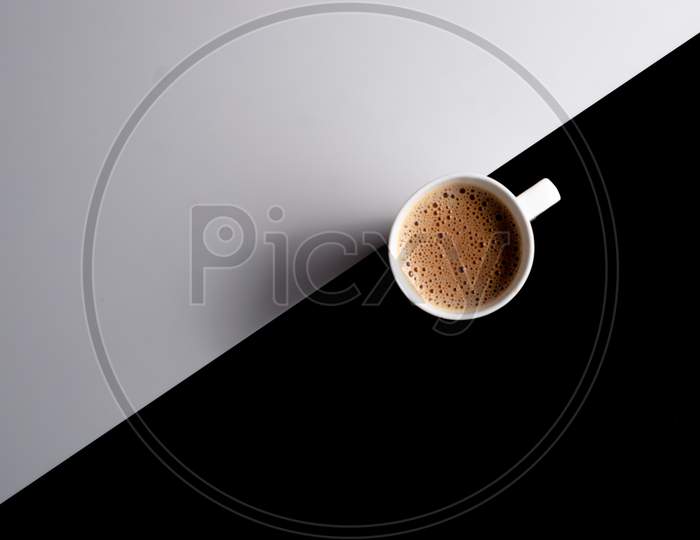 A Cup Of Tea On Black And White Background
