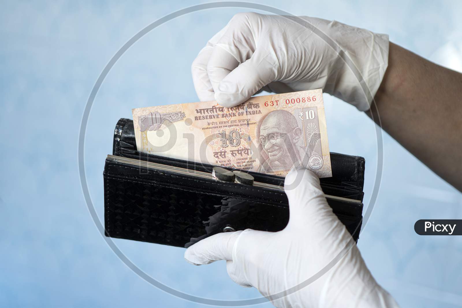 Woman Taking Money Out Female Wallet Wearing Rubber Gloves To Prevent The Spread Of Bacterias Or Viruses, Take Shopping During Coronavirus Pandemic. Microbes On Money. Refusal Of Cash.