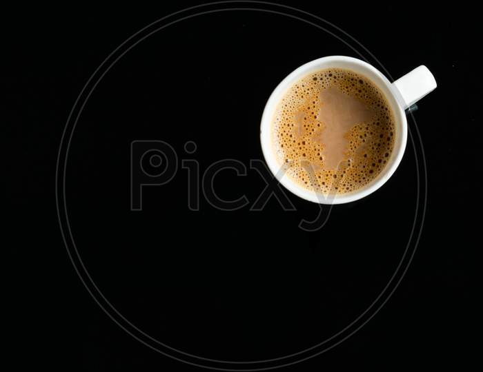 A Cup Of Tea On A Black Background