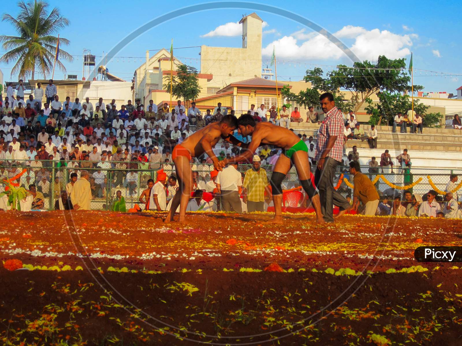 A Open Wrestling competition in Indian style known as Kushti or Dangal organised for the Tourists during the Dasara Festival at Mysuru in Karnataka/India.