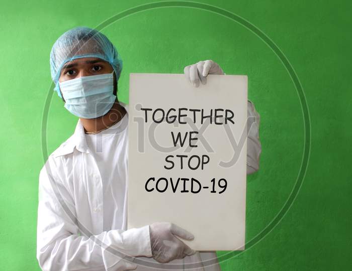 Medical Doctor With Inscription Concept Of Covid-19