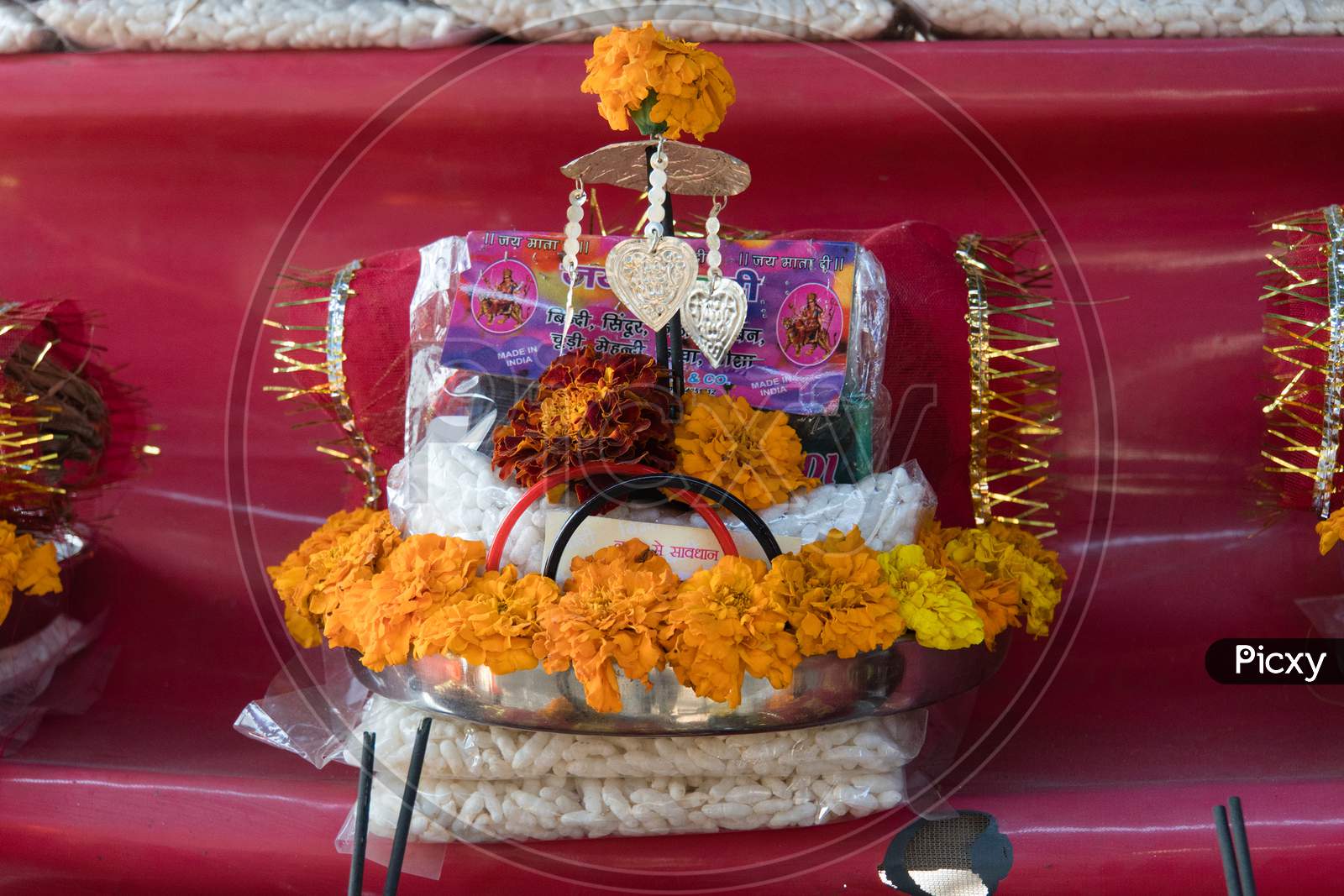 Garland From Orange And White Flowers In The Basket At Street Market Near Temple In Haridwar, India 8 January 2018.