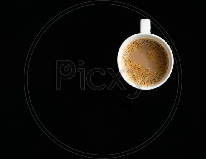 A Cup Of Tea On A Black Background