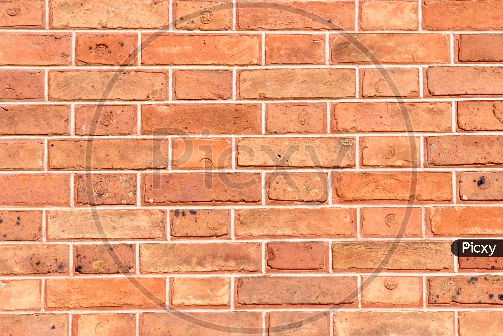 A Wall Made Up Of Visible Bricks Pattern Orange In Color Lokks Stunning