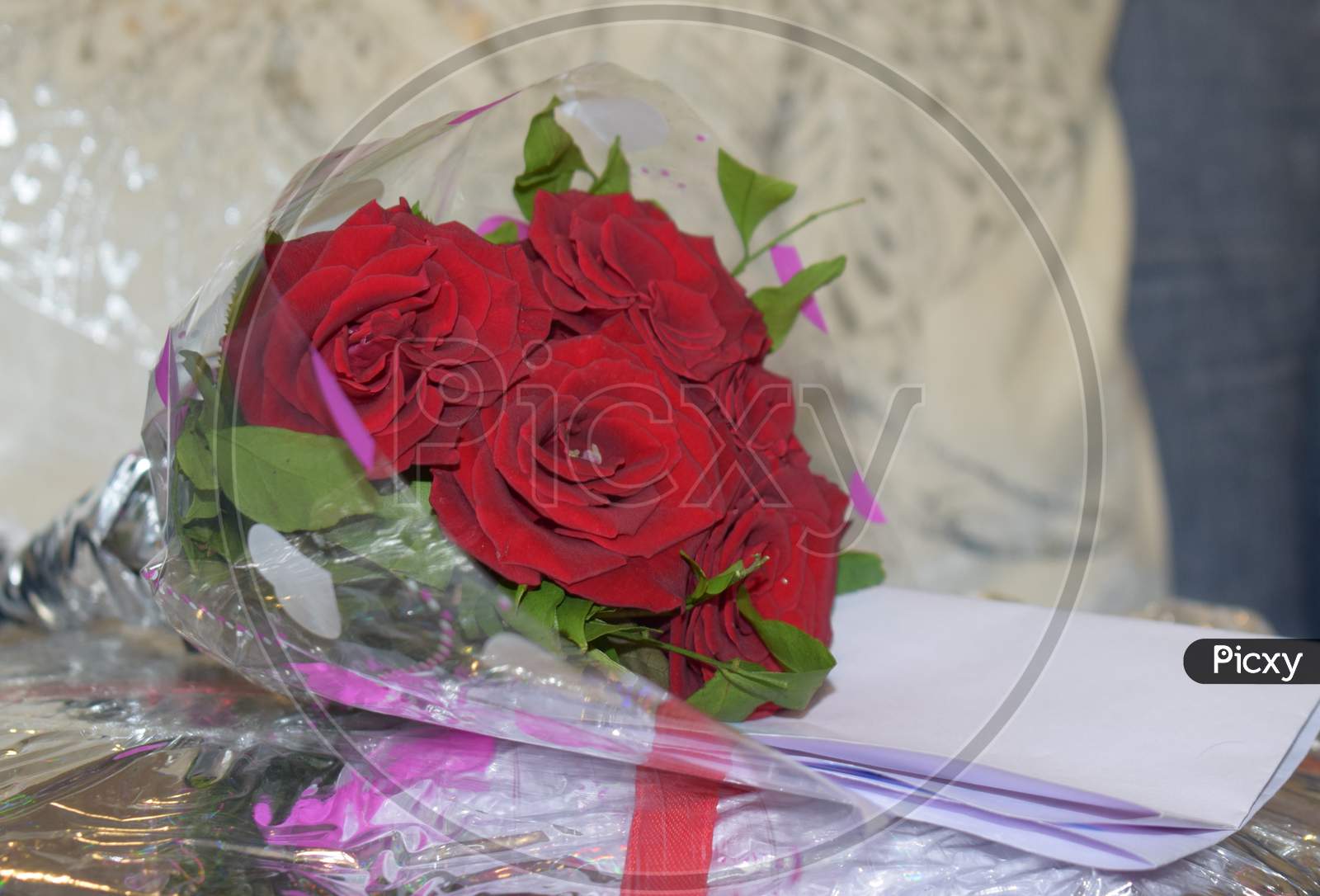 Rose Bouquet With A Letter Of Best Wishes