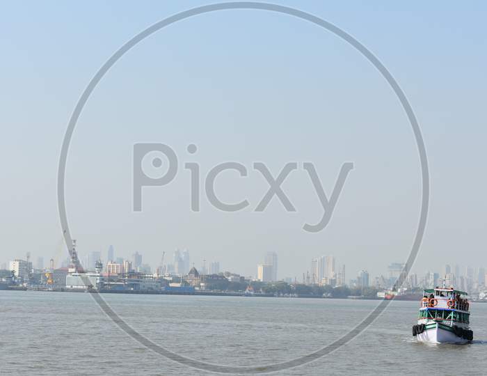 A Boat Taking Passengers Near Mumbai Port