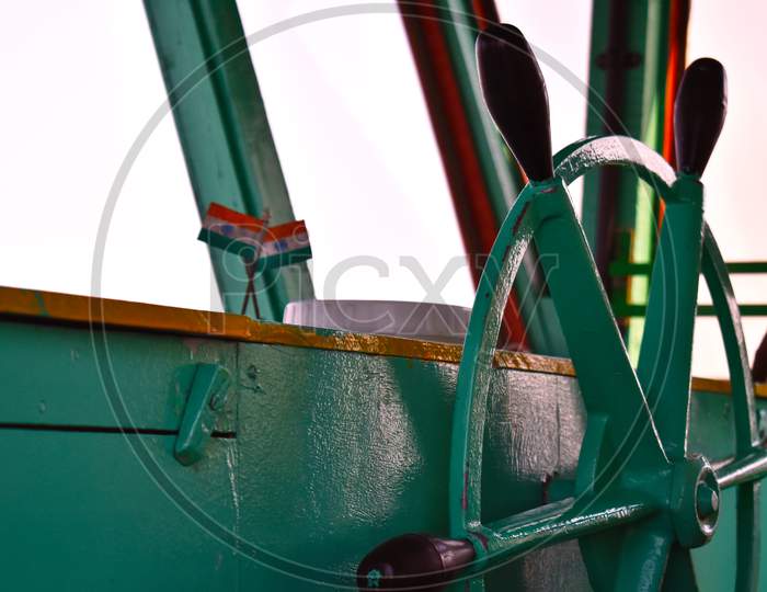 Closeup View Of The Steering Wheel Of A Boat
