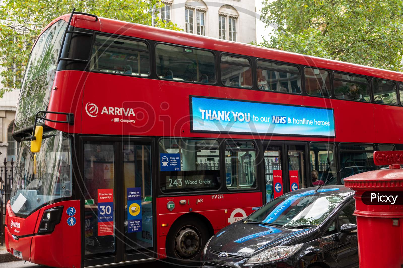 Red London Double Decker Bus With Thank You To Nhs Sign On The Side