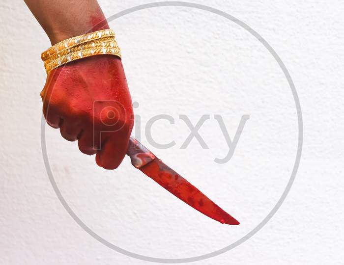 Woman Holding Knife On Hand With Blood Horror Of Scary Fear, She Revenge Murdered Of Her Lover. Toxics Relationship Concept & Halloween Day Festival Concept