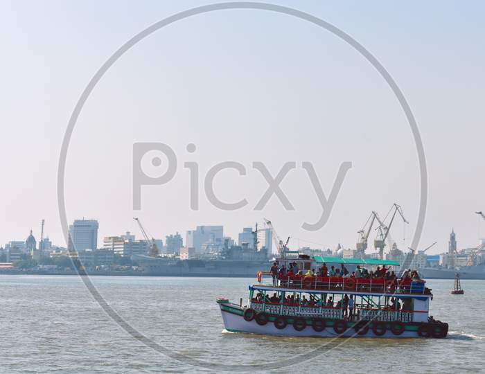 A Boat Carrying Passengers,Near Mumbai