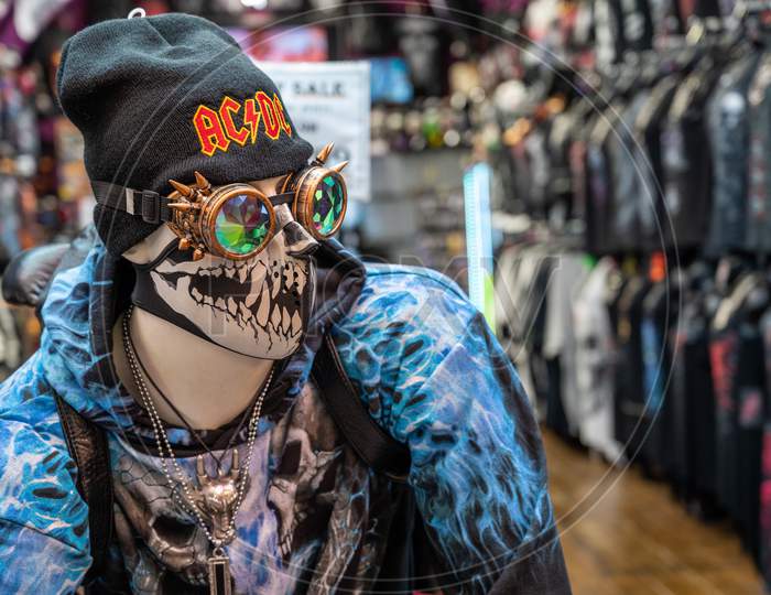 Elaborately Dressed Mannequin Wearing A Skeleton Face Mask At Entrance To A Market Stall At Camden Lock Market During Covid 19 Pandemic