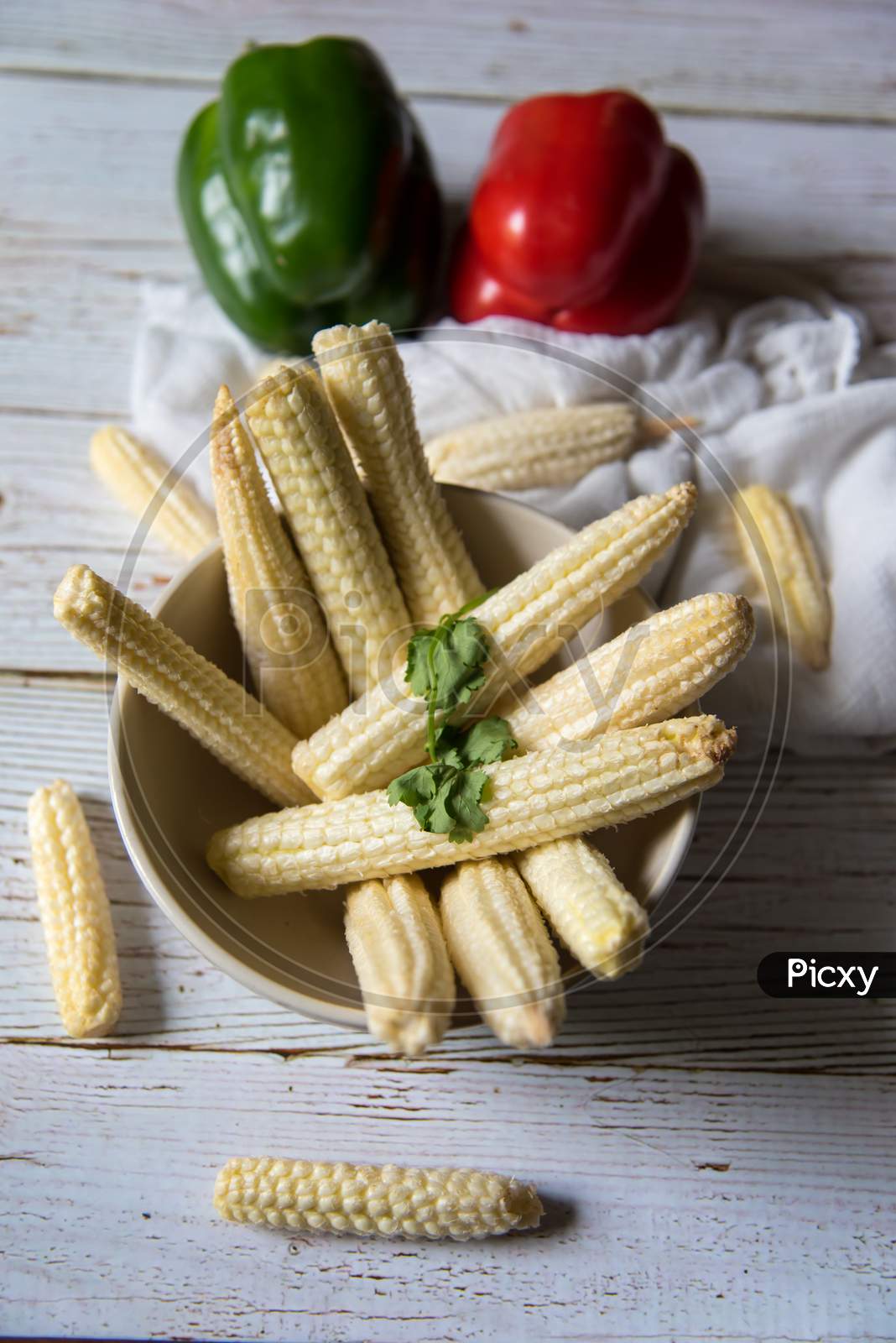 Healthy food raw ingredients baby corn and vegetables