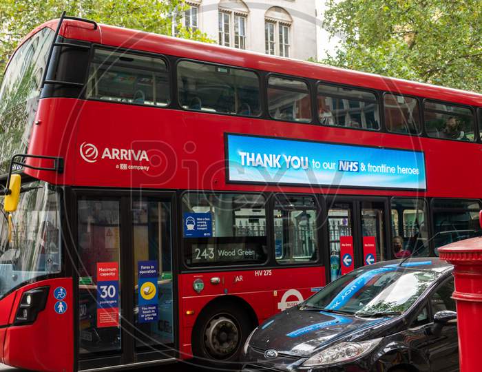 Red London Double Decker Bus With Thank You To Nhs Sign On The Side