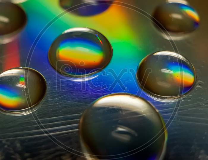 Reflection Of Water On Cd Discs.