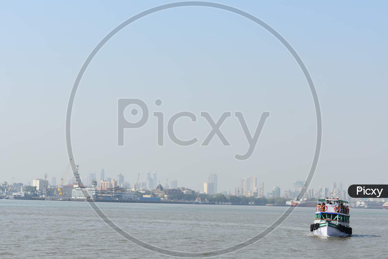 A Boat Taking Passengers Near Mumbai Port