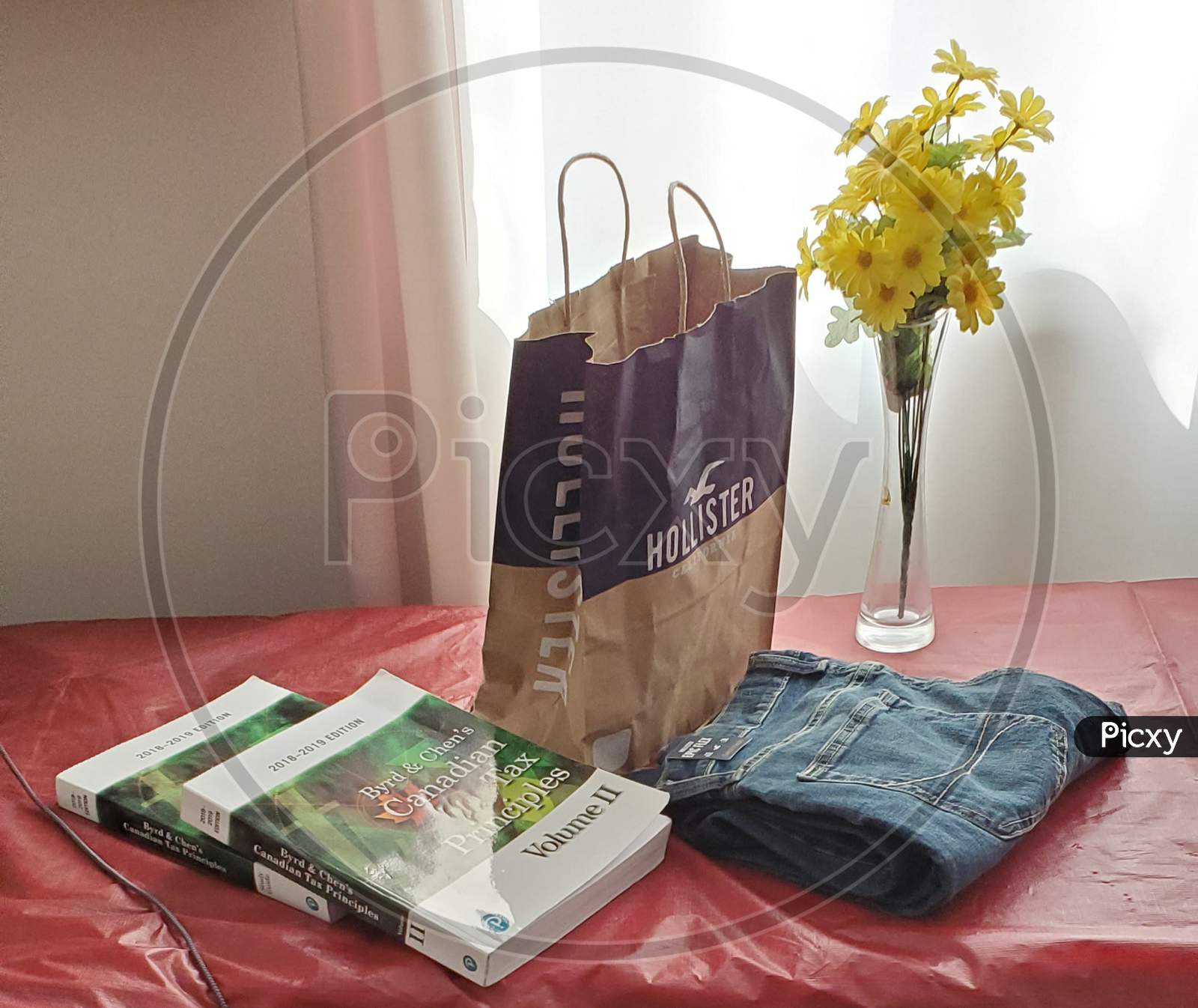 Plant,glass,paper bag,jeans