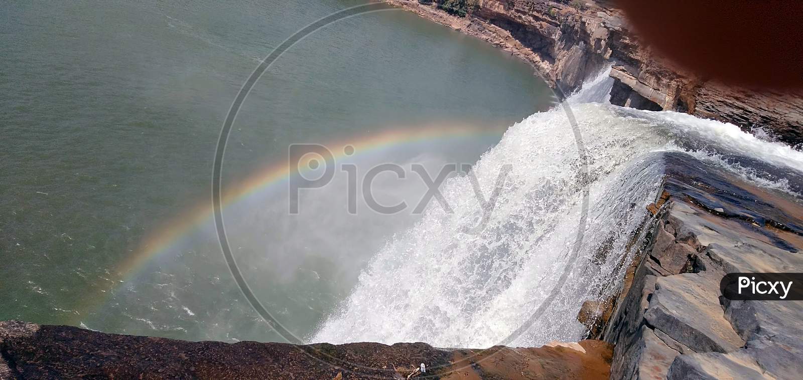 rainbow formation in the fountain of Chitrakoot waterfall of jagdalpur in bastar os chhattisgarh India.