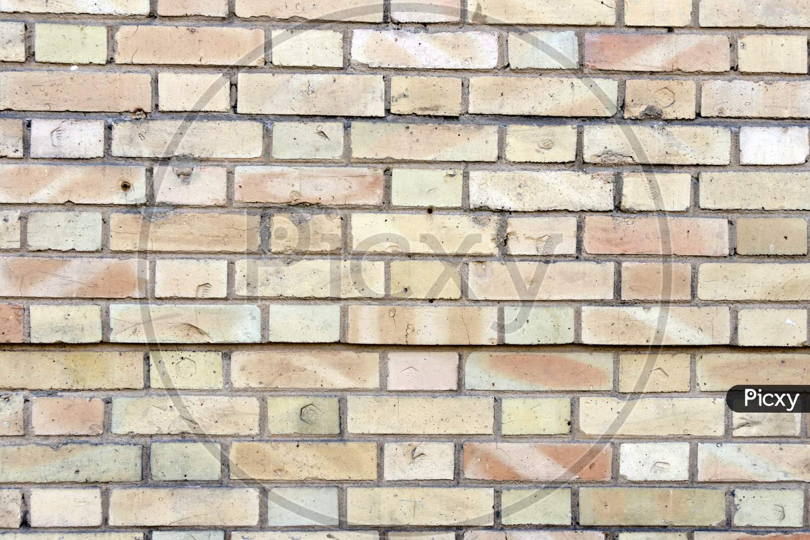 Wall Made Up Of Faded Colored Bricks Looking Stunning In Rectangular Pattern