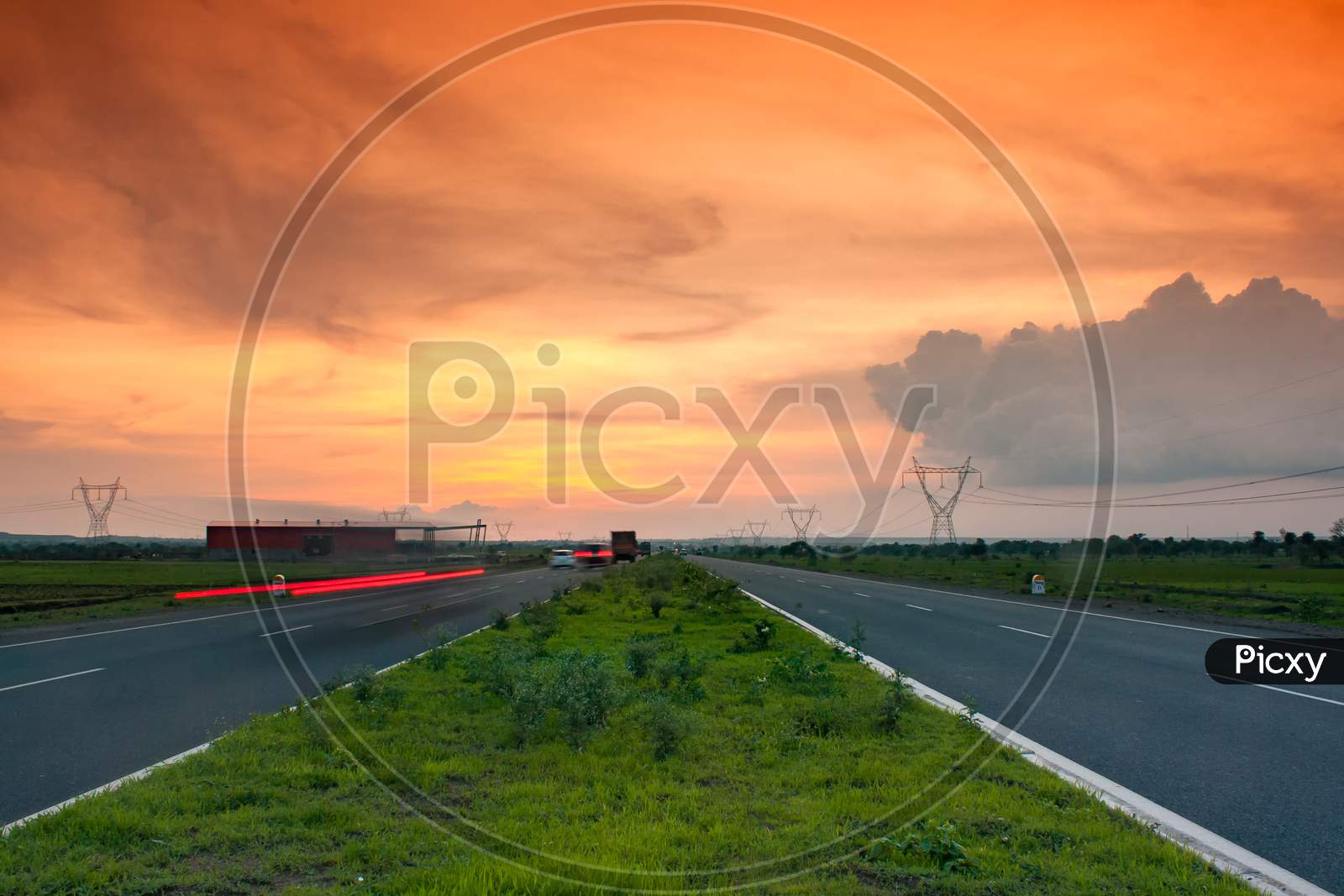 Highway On Dusk With Movement Of Vehicle.