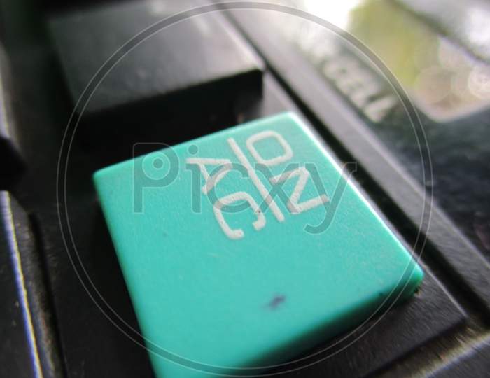 Close-up calculator on key,blue