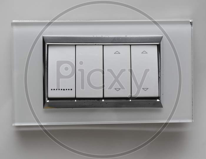 Designer Electrical Switch Board With Five Switch On Laminated Tile
