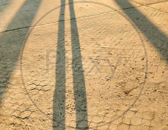 Long Shadow Photograph On A Sunset.