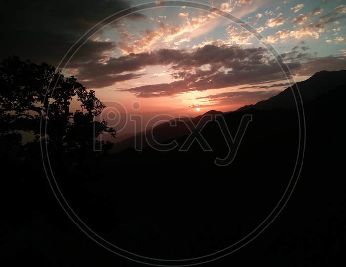 Sunset view in India Himalayas mountains Dharamshala Mcleodganj triund Himachal Pradesh