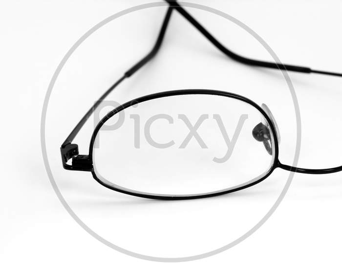 Closeup Of Eyeglass With Black Border