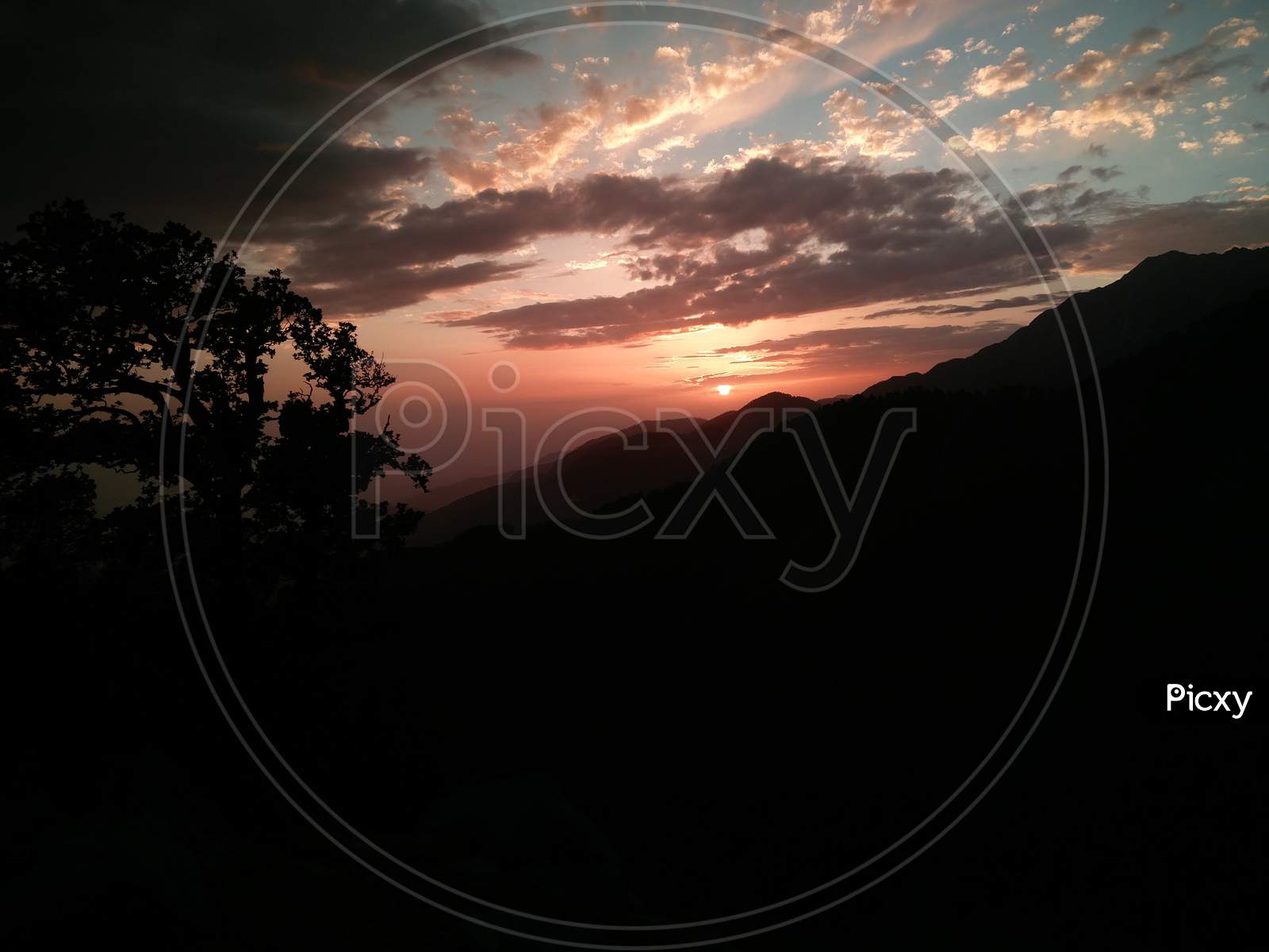 Sunset view in India Himalayas mountains Dharamshala Mcleodganj triund Himachal Pradesh
