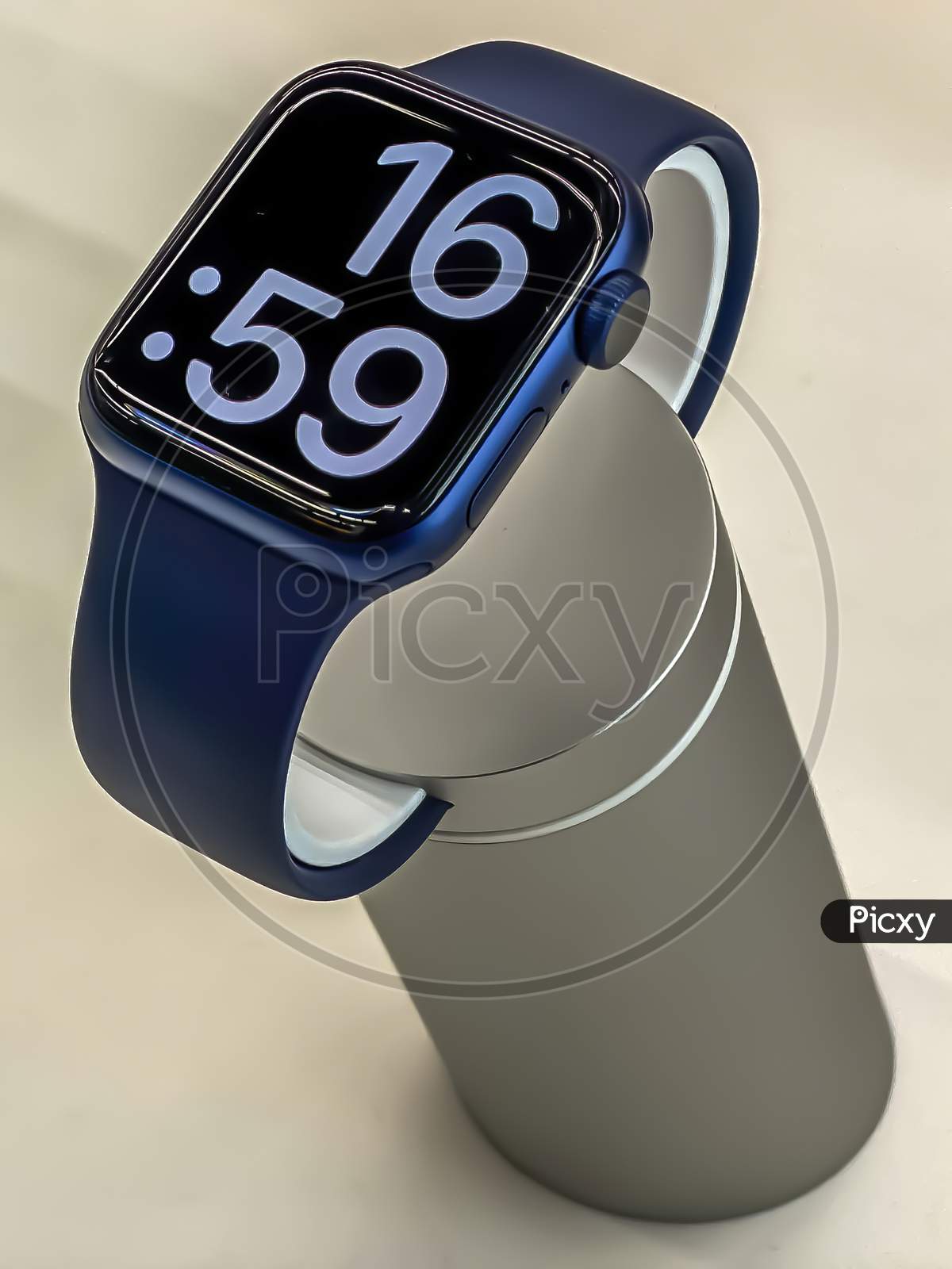 Darmstadt, Germany - September 25th 2020: A photographer visiting a Saturn market taking pictures of the Apple area with the new Apple Watch Series 6 in the new color blue.